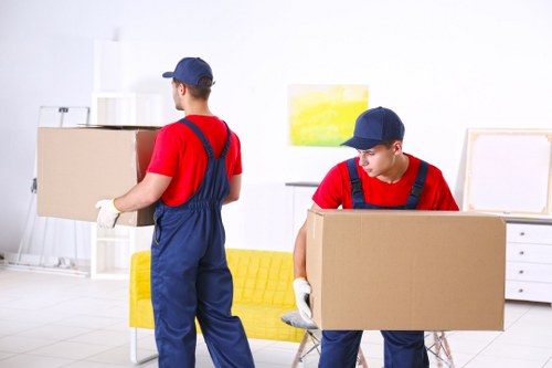 Moving team supporting a home move in Hammersmith with boxes and furniture