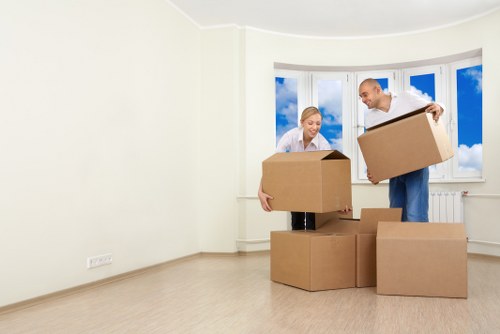 Unpacking boxes and setting up rooms in a Hammersmith property