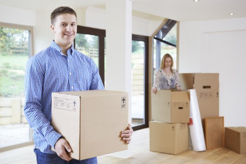 Team preparing a safe moving job with careful lifting and planning