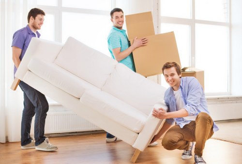 Health and safety focused moving team working with caution and care
